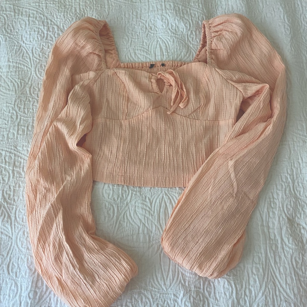 light pink long sleeve blouse